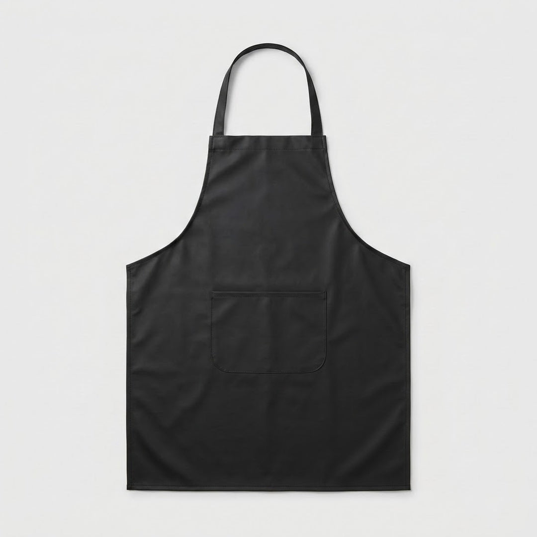 A black bib apron with a single neck strap and a front patch pocket, shown flat against a light gray background.