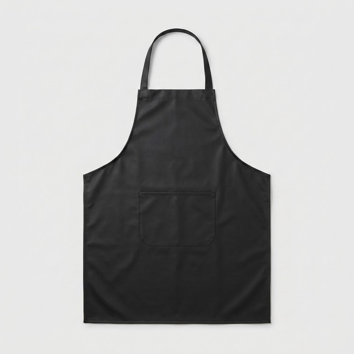 A black bib apron with a single neck strap and a front patch pocket, shown flat against a light gray background.
