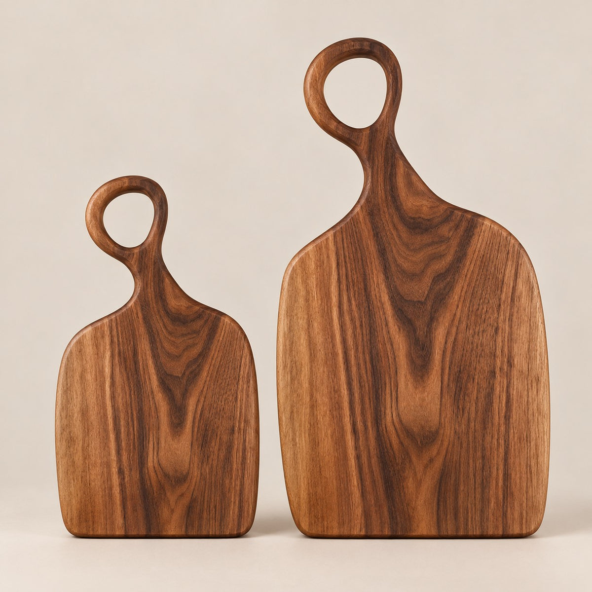 Handmade Acacia Cutting Board small and large pair displayed together on a neutral studio backdrop.