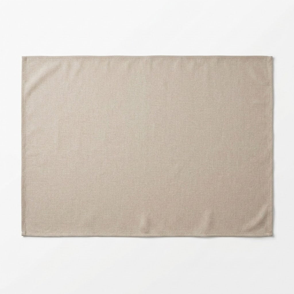 A rectangular beige linen placemat with a subtle woven texture, laid flat against a clean white background.