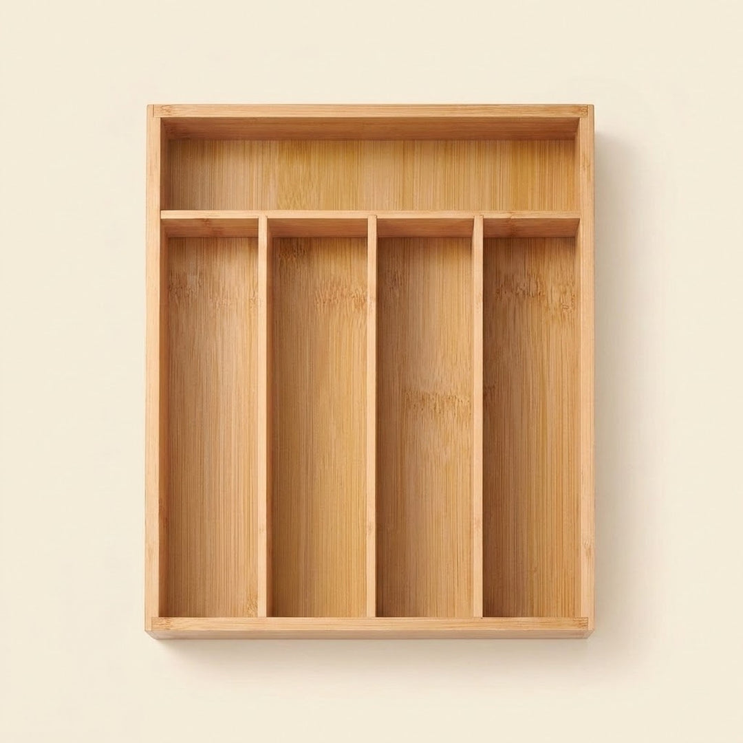 A rectangular bamboo organizer tray with four vertical compartments and a top shelf, shown against a plain beige background.