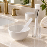 Face mask mixing bowl set arranged at a bathroom vanity for a tidy at-home mask routine.