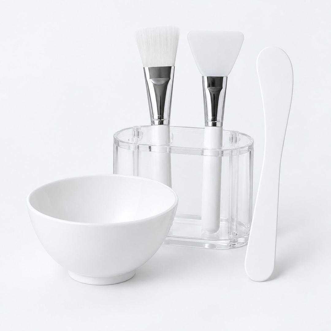 Two-applicator face mask mixing bowl set with bowl, spatula, brush, silicone tool and holder.
