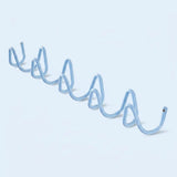 A light blue spiral wire coat rack hook displayed diagonally on a clean, solid pale blue background.