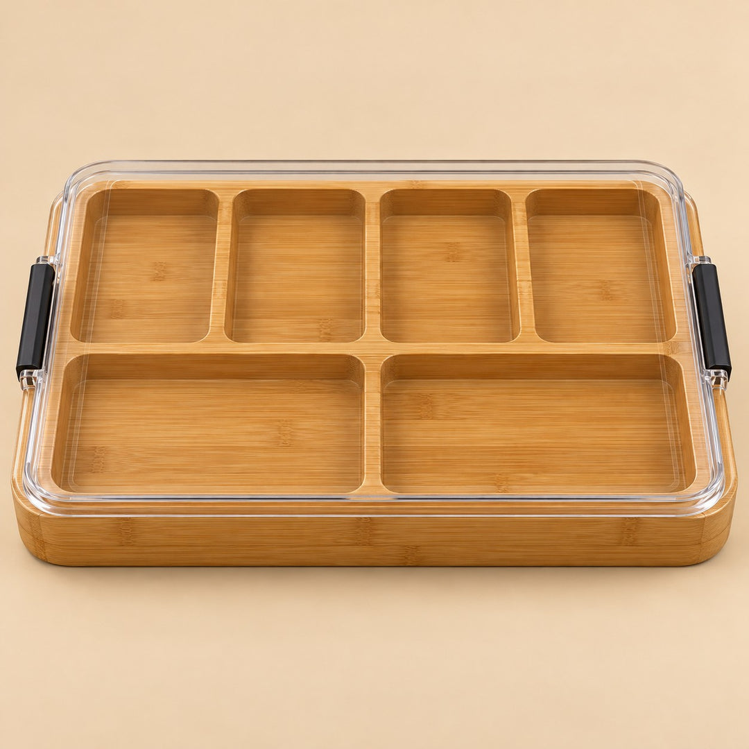 The Six-Compartment Charcuterie Board has six bamboo sections under a clear lid.