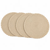 Four beige round woven placemats with braided edges arranged on a white background.