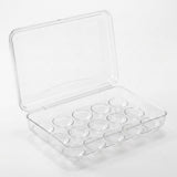 A clear plastic round cup organizer case with a hinged lid, shown open on a white background.
