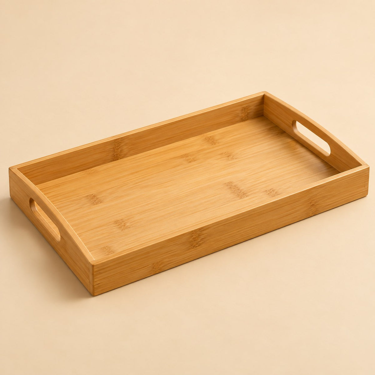 Bamboo and wood serving tray in the 38 by 25 cm size, shown alone on a warm beige studio backdrop.