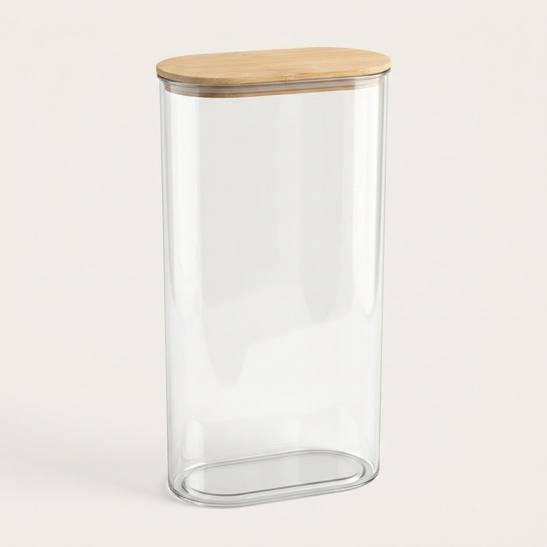 A tall, clear glass canister with a rounded rectangular base and a light natural wood lid, shown on a clean off-white background.