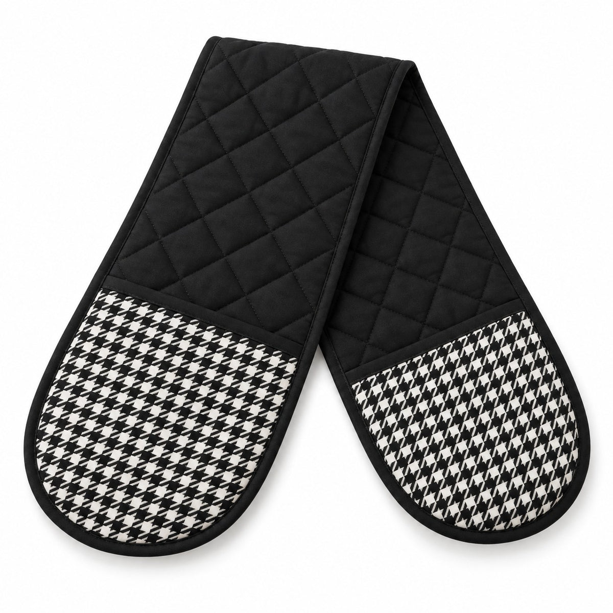 One black quilted houndstooth double oven mitt lies alone on a white background.