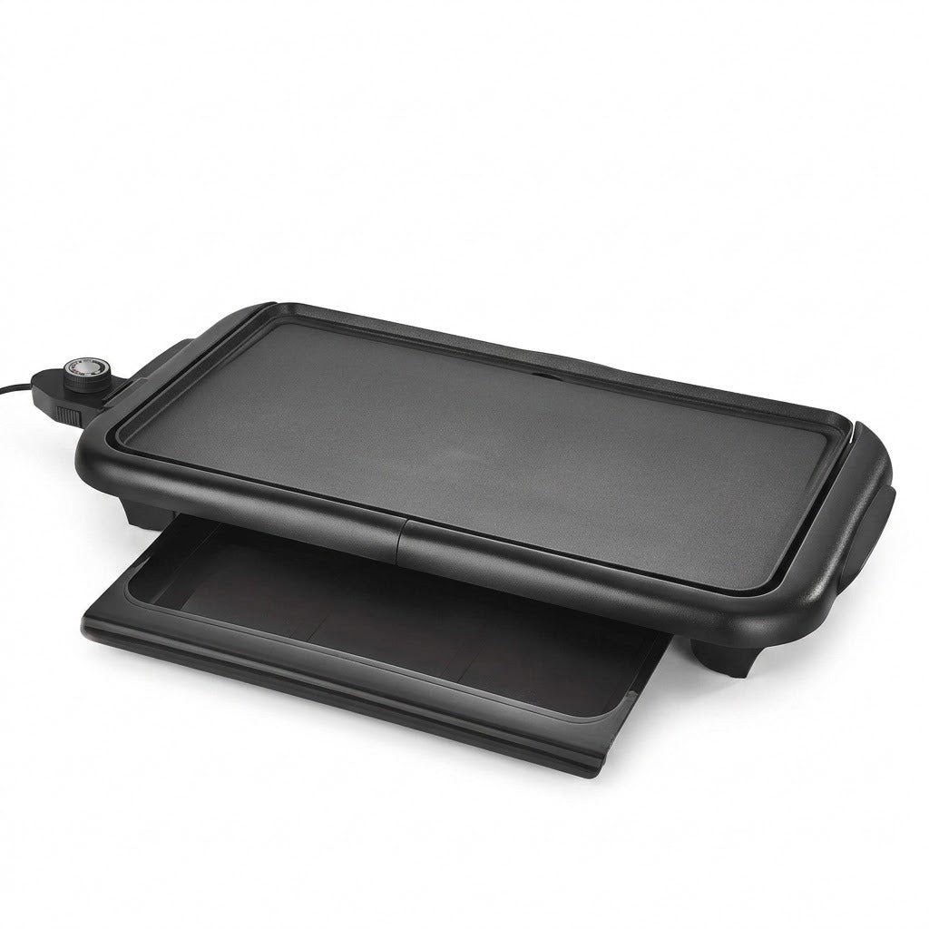 Black electric flat-top grill with a sliding plate and power cord, shown on a white background.