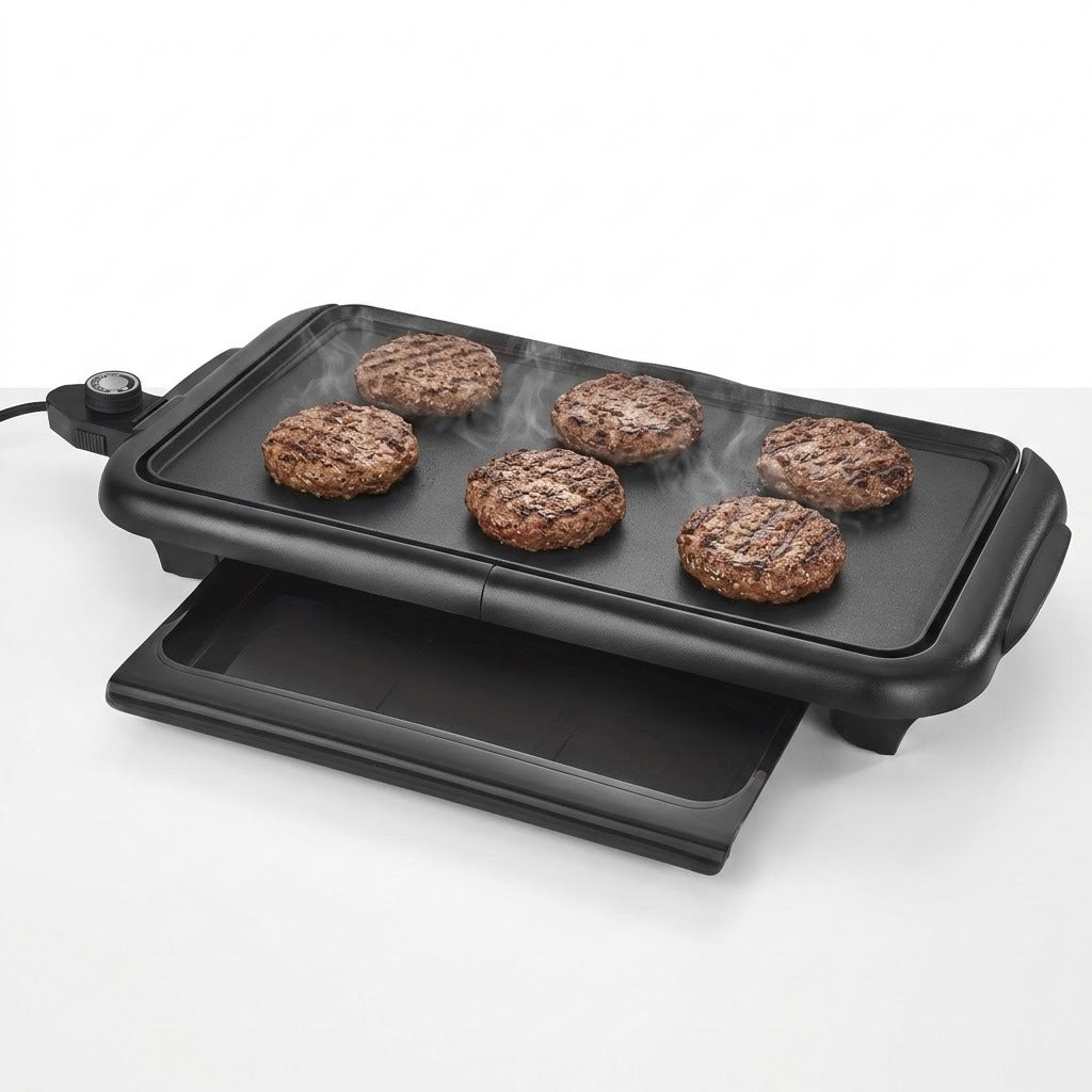 Black electric flat-top grill with six burger patties cooking on a clean white background.