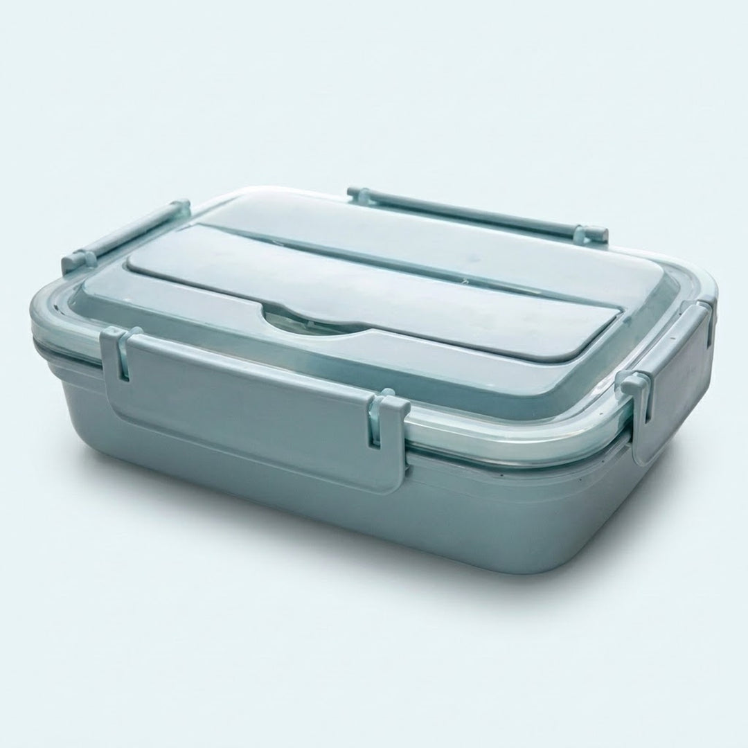 A rectangular plastic lunch box with a matching lid, shown on a clean light gray background. The container has a muted blue-gray color with a translucent lid and molded handle details.
