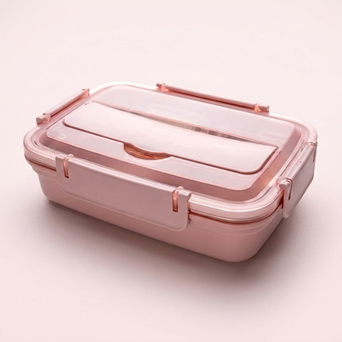 A rectangular pink plastic lunch box with a matching translucent lid and secure latches, shown on a clean, solid, light pink background.