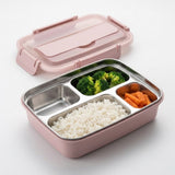 A pink compartment bento lunch box with a stainless steel interior, shown with white rice, broccoli, and carrots, with its matching pink lid placed behind it on a clean white background.