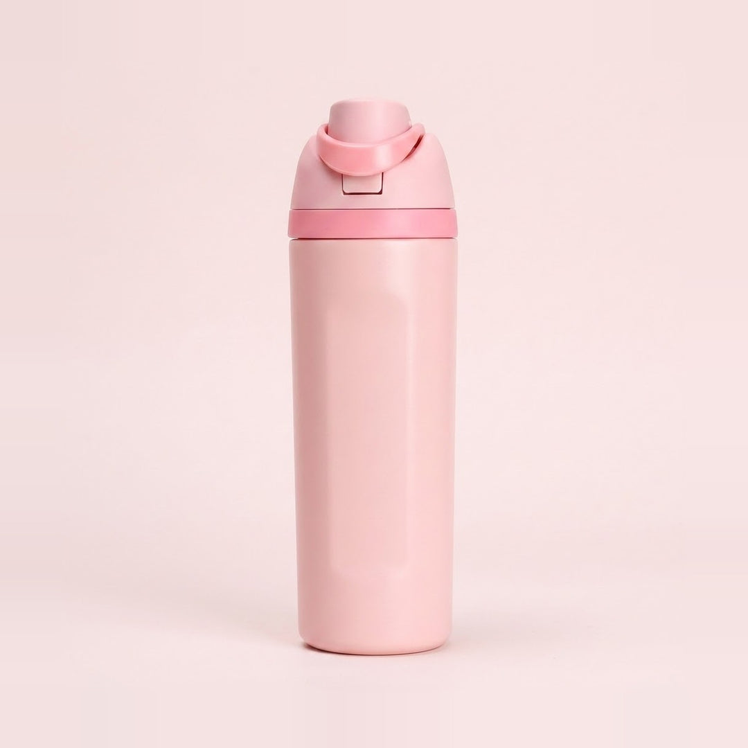 A tall, matte pink water bottle with a matching pink flip-top lid and carrying loop, centered on a solid pale pink background.