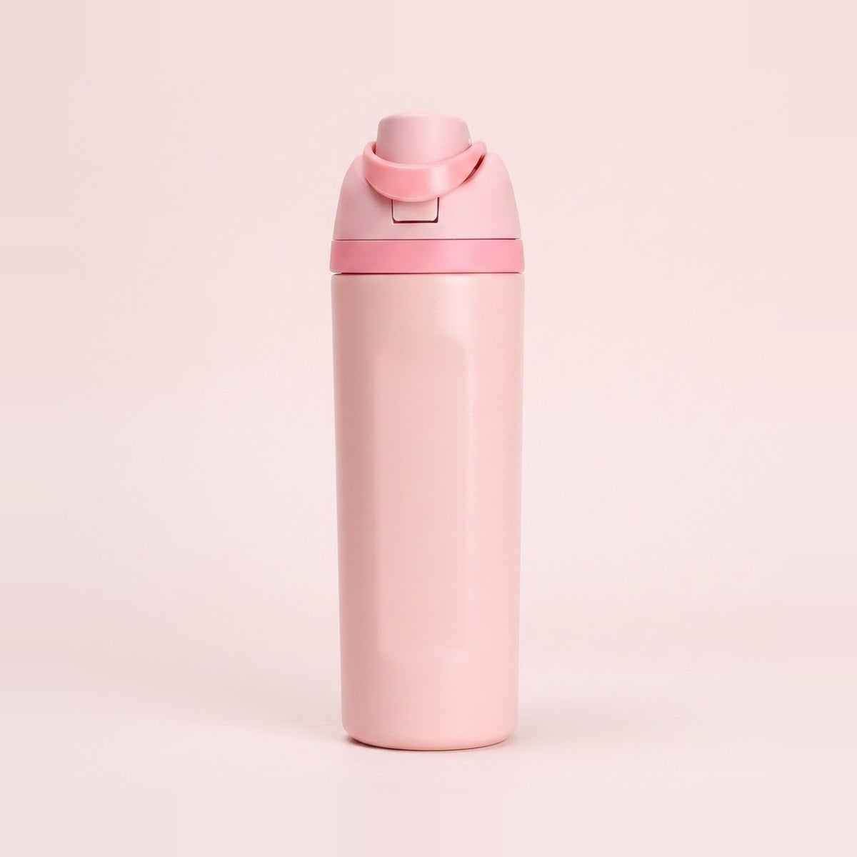A tall, matte pink water bottle with a matching pink flip-top lid and carrying loop, centered on a solid pale pink background.