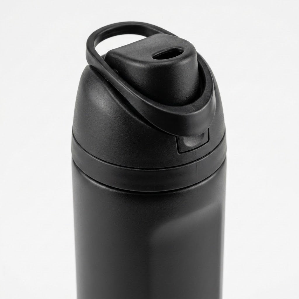 A close-up of a matte black insulated water bottle with a flip-top lid and integrated carrying loop, shown against a clean white background.