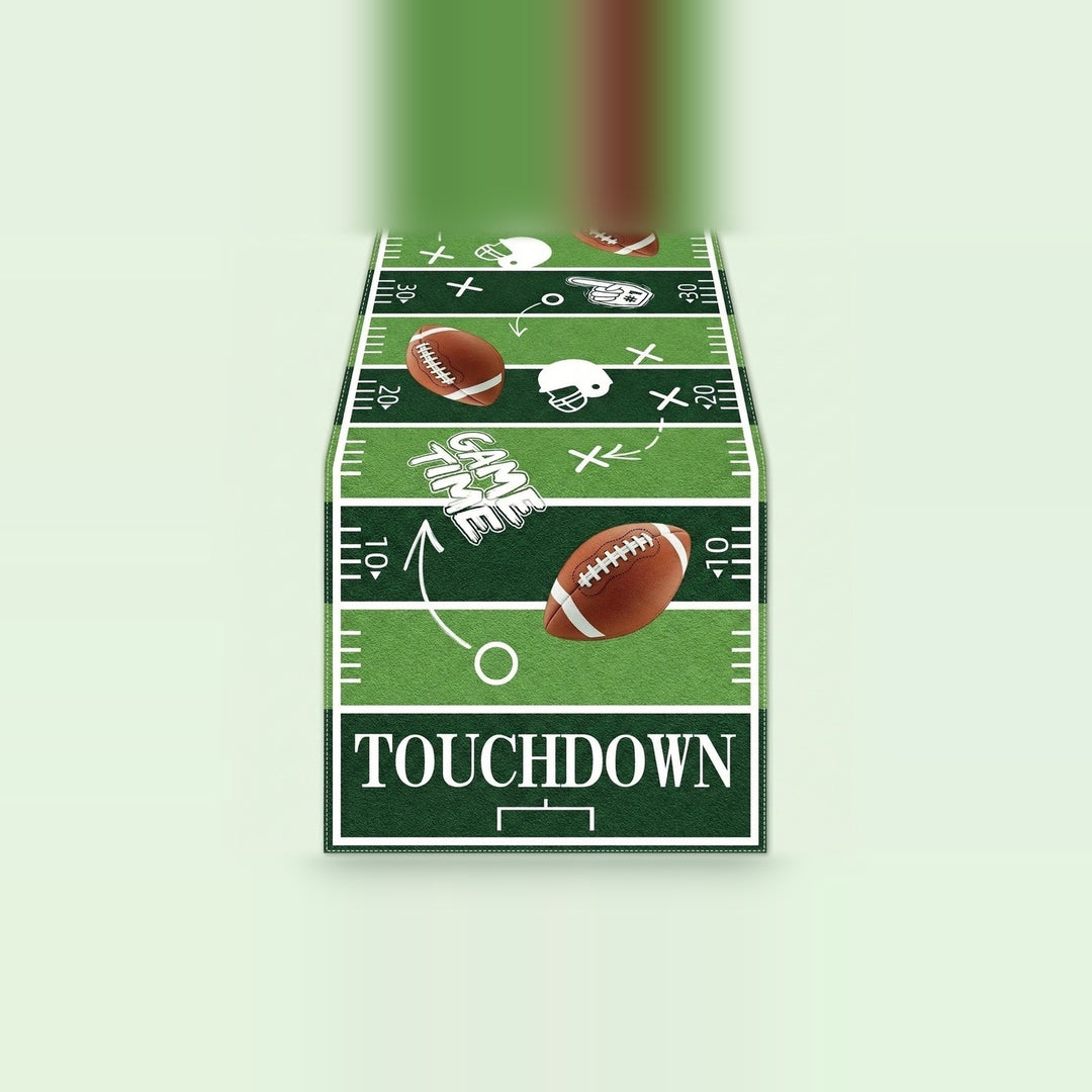 A rectangular wall decal or sign featuring a football field design with the word 'TOUCHDOWN' in large white letters, illustrated footballs, helmets, and play icons, shown against a pale mint background.
