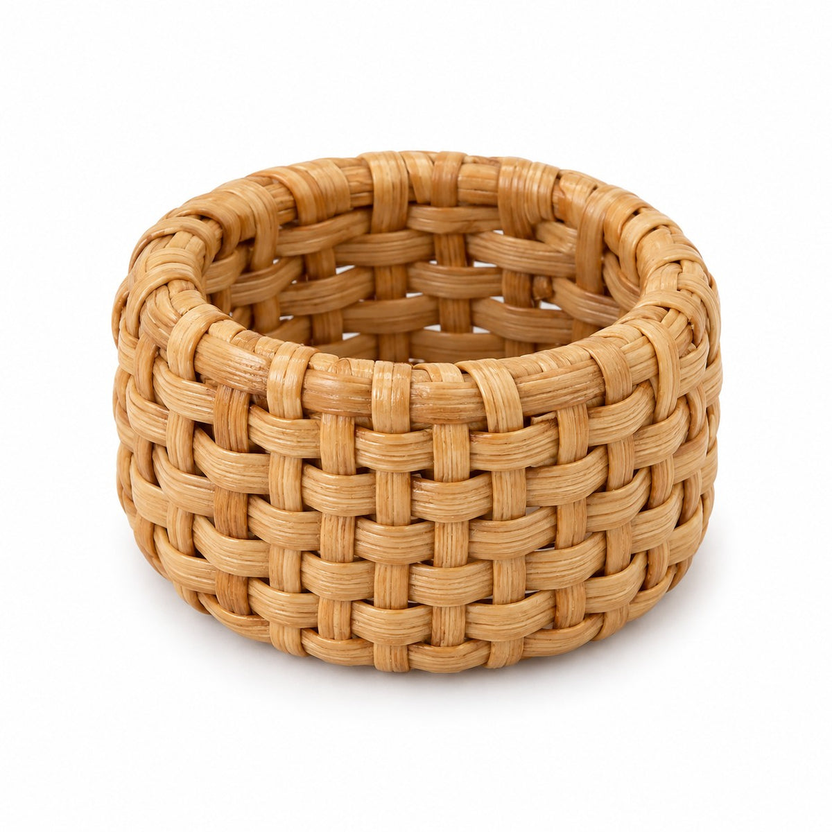 One natural basket weave rattan napkin ring shown alone against a white background.
