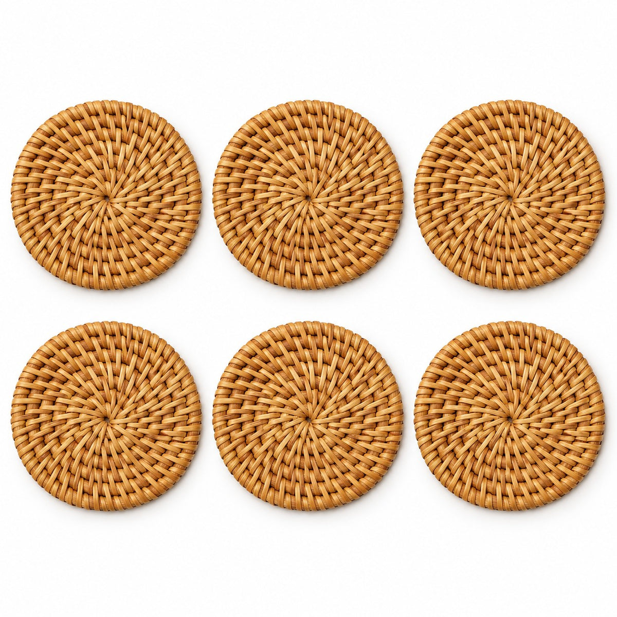 Six round rattan coasters arranged on white show the pieces included in the set.