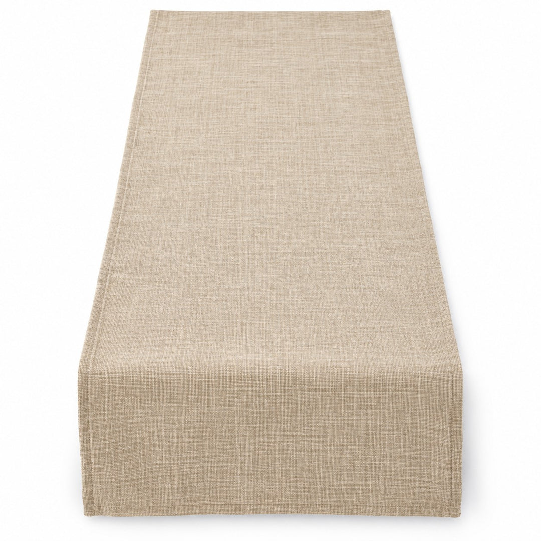 One beige rectangular linen table runner laid flat alone against a white studio background.