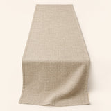 Beige rectangular cotton linen table runner centered on a soft beige studio background.