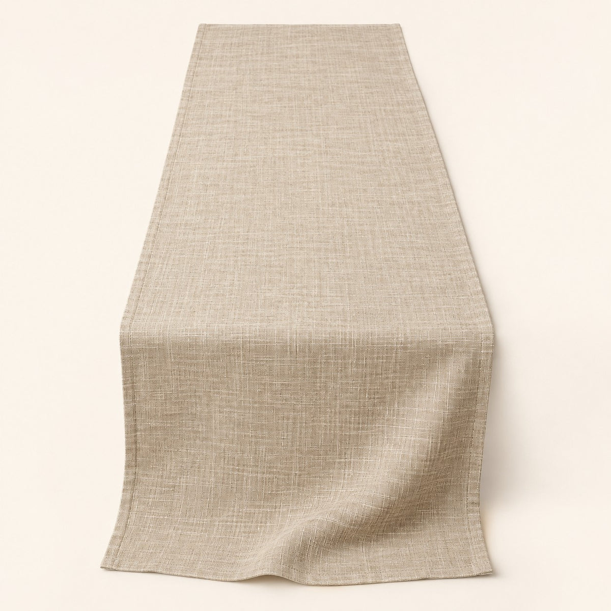Beige rectangular cotton linen table runner centered on a soft beige studio background.