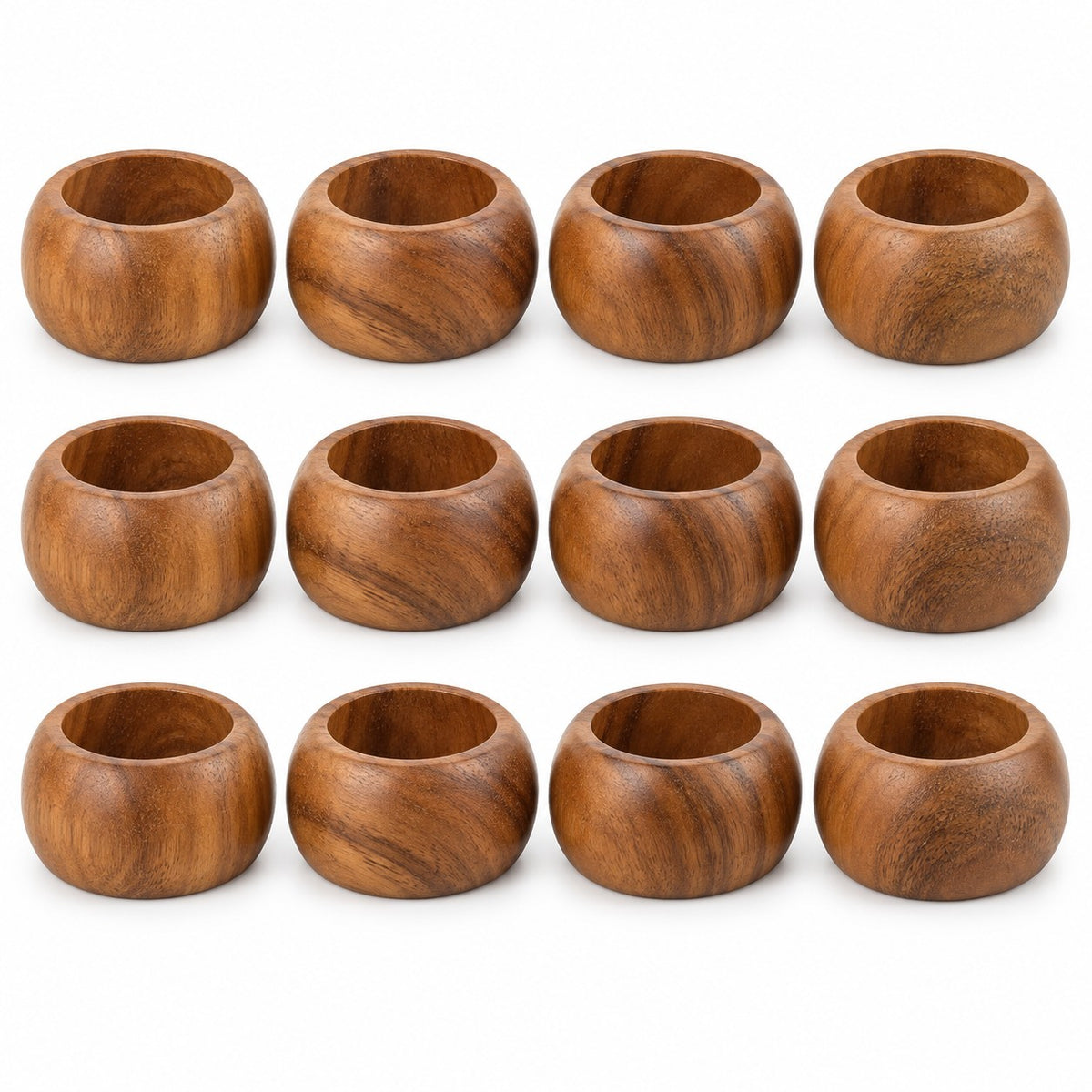 Twelve matching acacia wood napkin rings are arranged together on a clean white background.