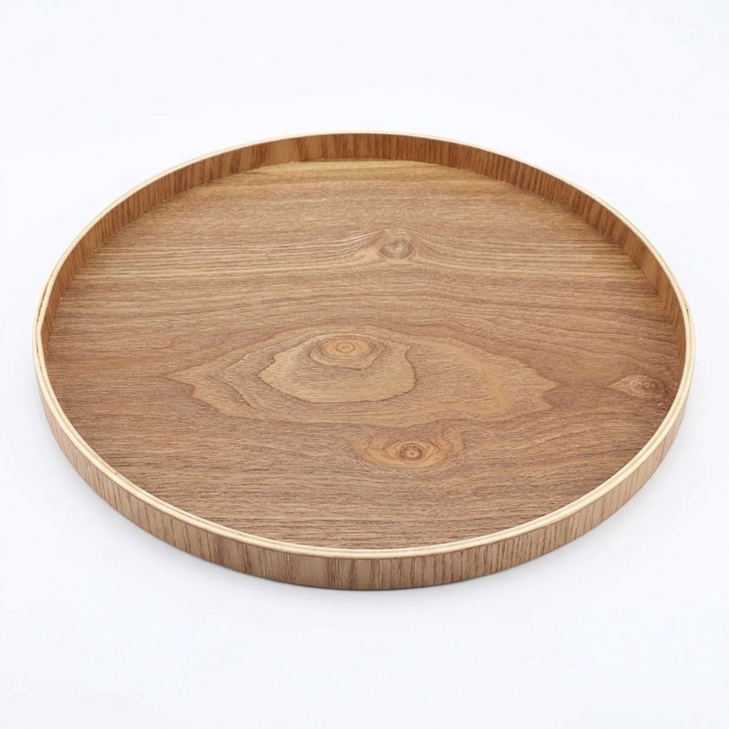 A round wooden serving tray with a natural wood grain pattern and a smooth, light-colored rim, shown on a plain white background.