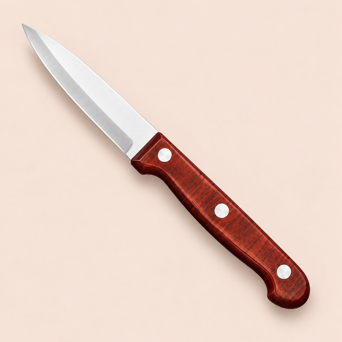 One stainless steel paring knife with a reddish three-rivet handle on a soft rose backdrop.