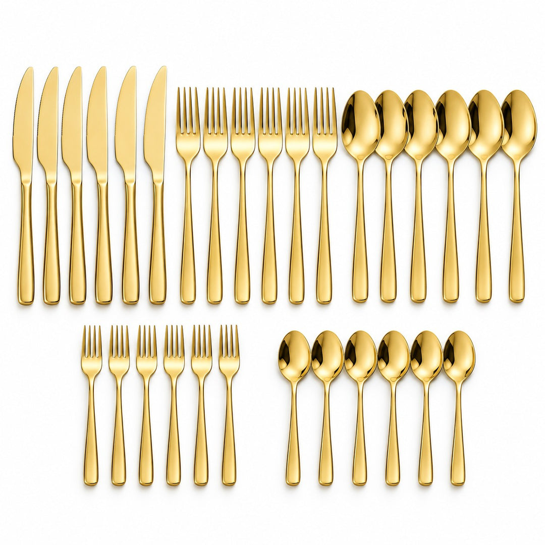 The 30-piece gold stainless steel cutlery set is arranged in groups of knives, forks, spoons and tea utensils.