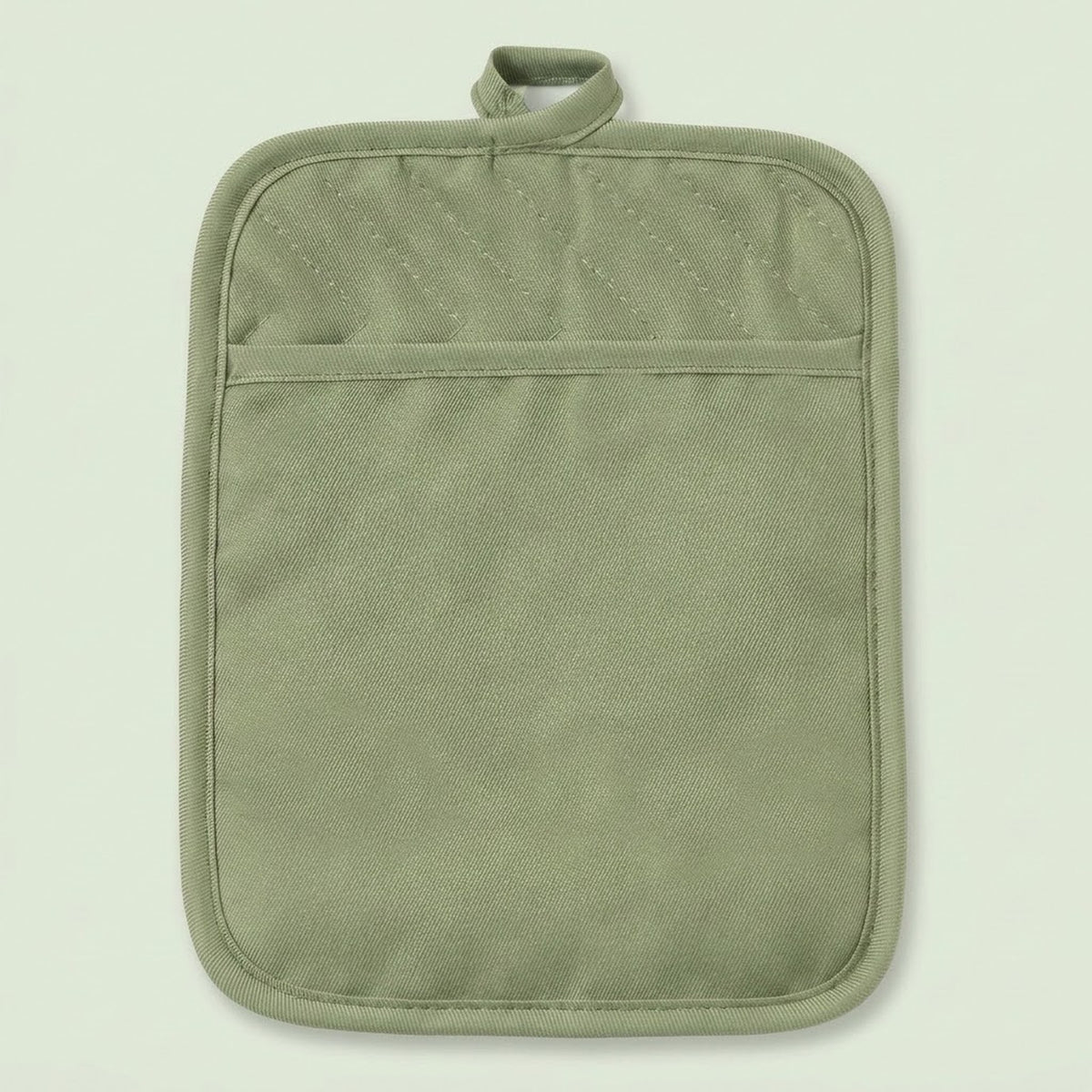 An olive green quilted fabric pot holder with a top loop handle and a horizontal seam creating a front pocket, shown against a solid pale green background.