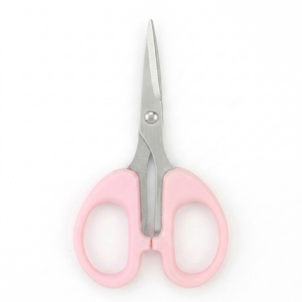 Small pink-handled scissors with silver metal blades, centered on a plain white background.