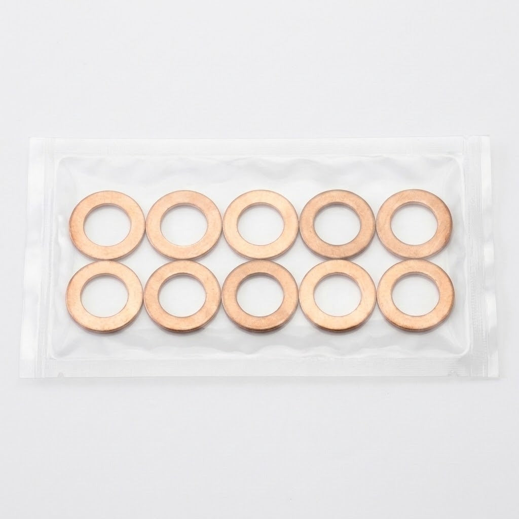 Ten copper-colored flat washers arranged in two rows inside a clear plastic bag on a light gray background.