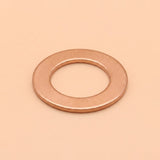 A single flat metal washer with a warm copper or rose-gold metallic finish, centered on a solid peach-beige background.