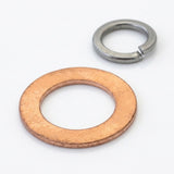 A copper washer in the foreground and a silver metal split lock washer in the background, photographed on a clean white surface.