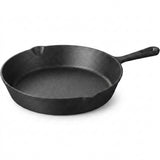 A black cast iron skillet with a single handle, photographed on a clean white background.