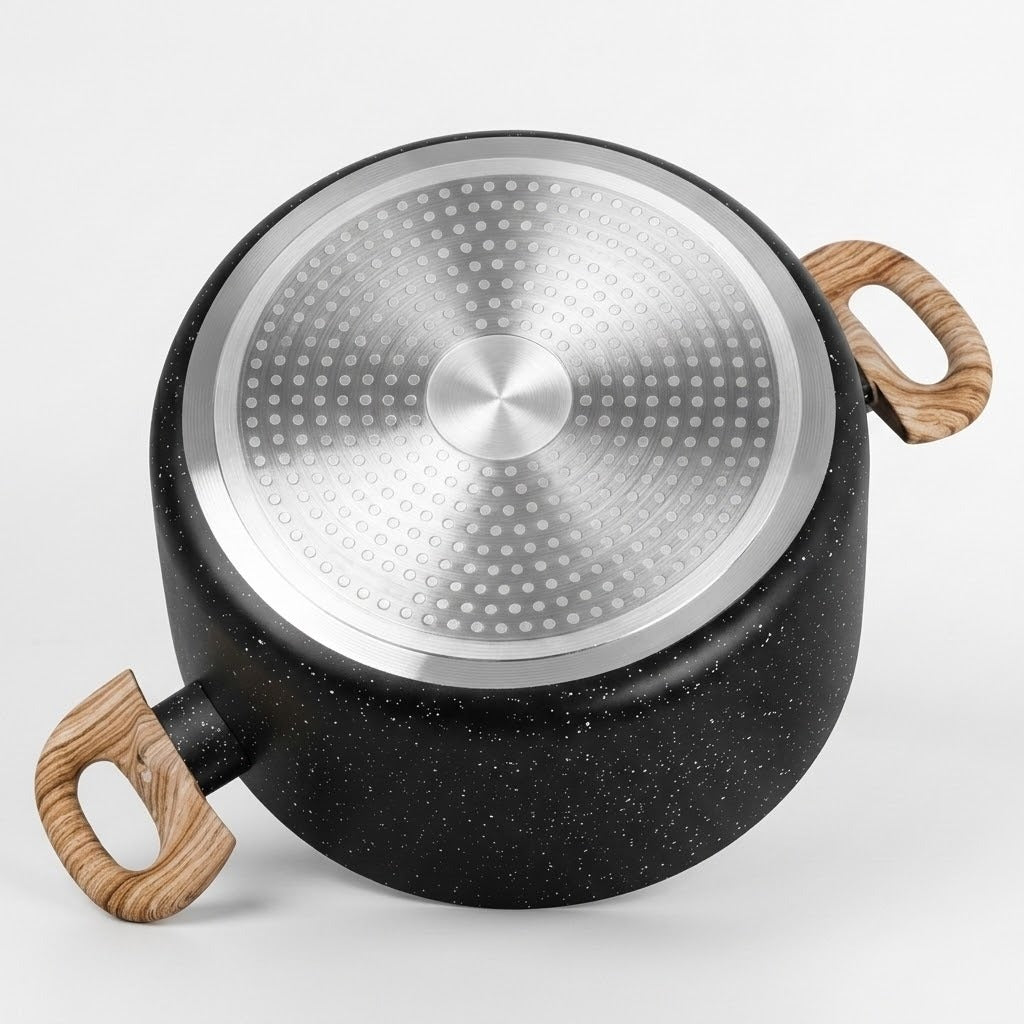 A black speckled pot with a brushed silver aluminum bottom and two light brown wooden handles, shown from a top-down angle on a light gray background.