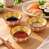 Bohemian Ceramic Sauce Bowls hold separate dips beside sushi on a wooden dining table.