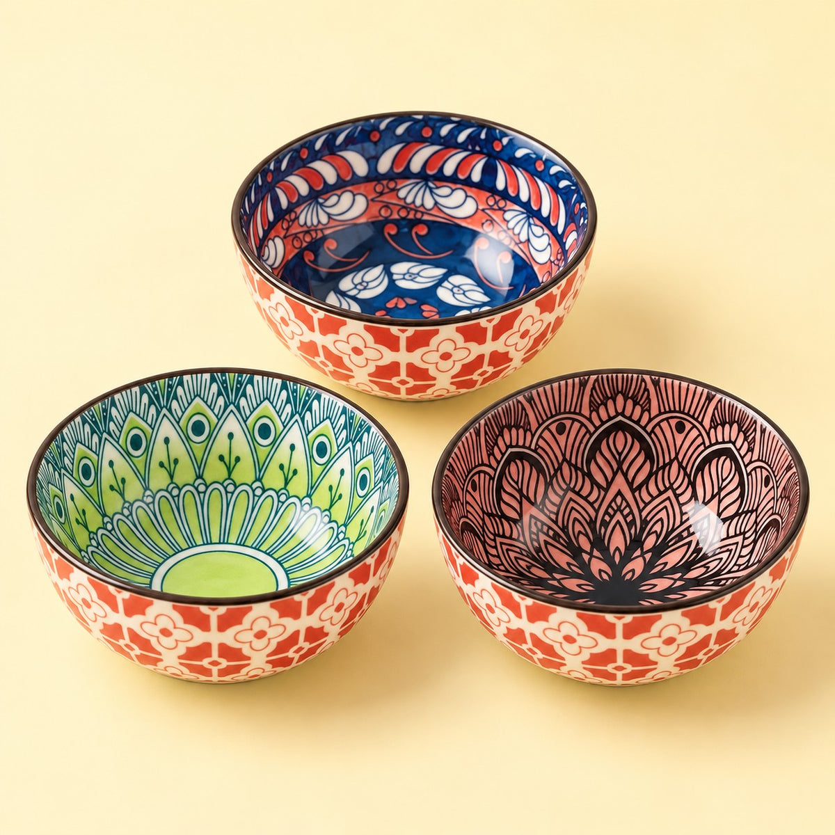 Set of 3 Bohemian Ceramic Sauce Bowls arranged on a soft warm studio backdrop.