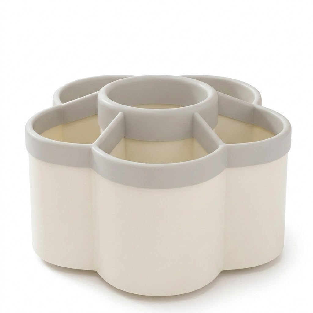 A flower-shaped silicone cup organizer with five compartments, featuring a warm cream body and light gray rims, shown on a white background.