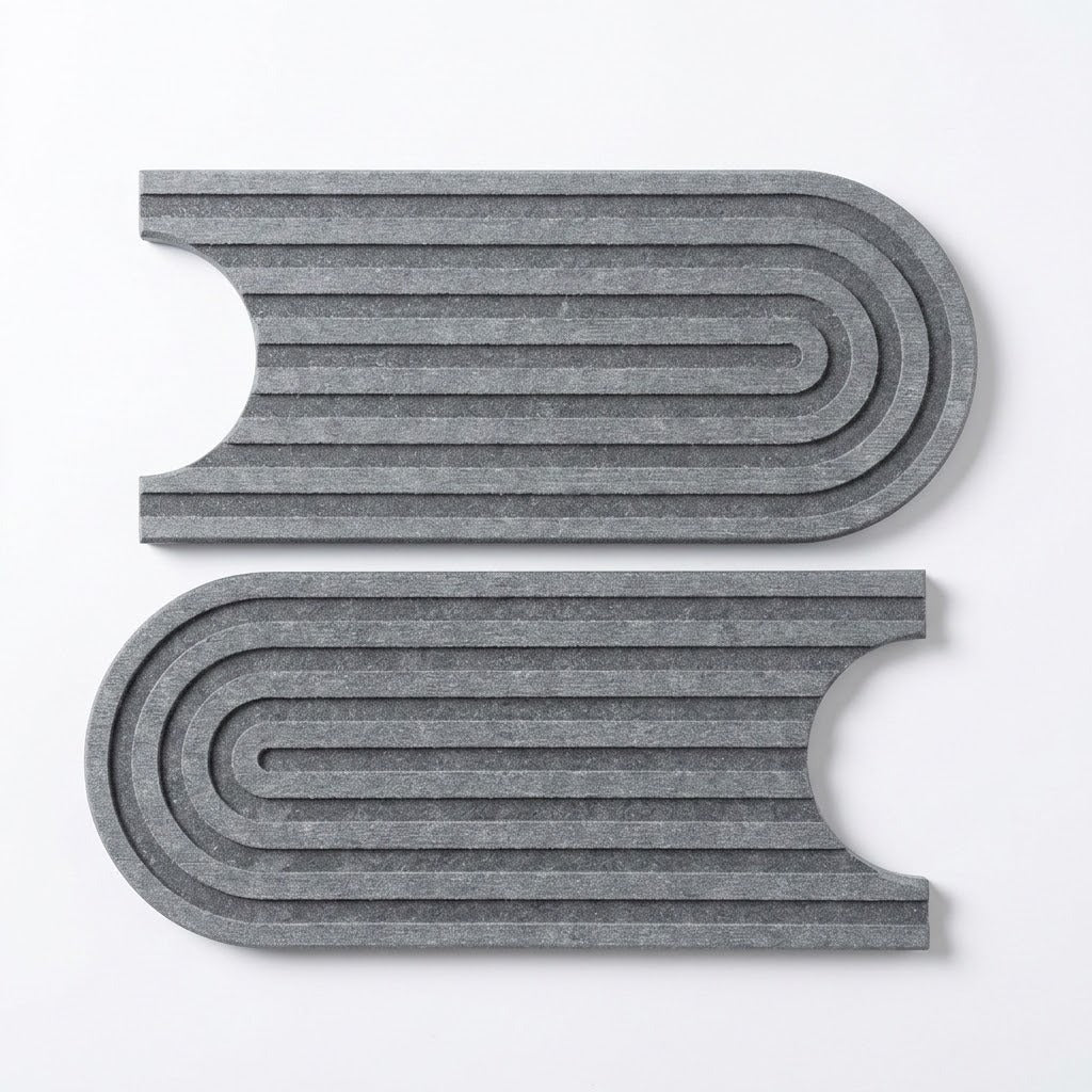 Two gray felt key hooks with a modern wavy, layered design, displayed on a clean white background.
