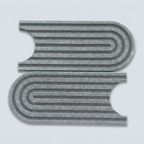 Two gray felt rectangular pieces with curved cutouts and concentric wavy ridges, shown on a light gray background.