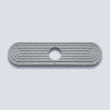 A metallic silver oval-shaped hardware piece with concentric ridges and a circular cutout in the center, shown on a light gray background.