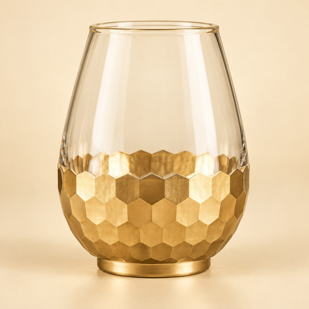 Small Gold Honeycomb Glass Vase shown alone against a soft warm gold studio background.