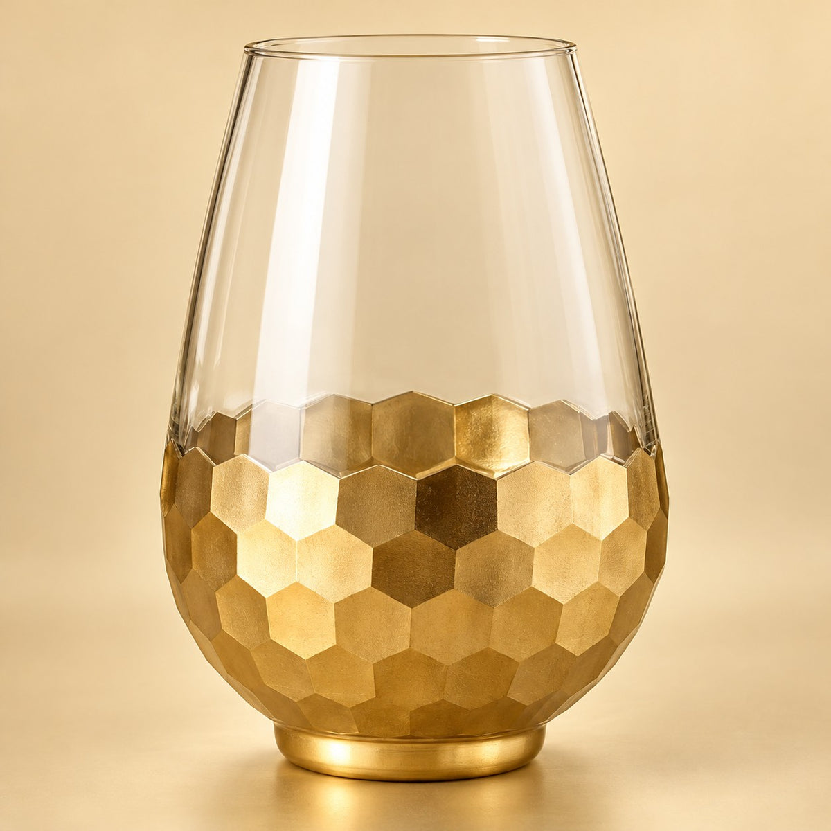Large Gold Honeycomb Glass Vase shown alone against a soft warm gold studio background.