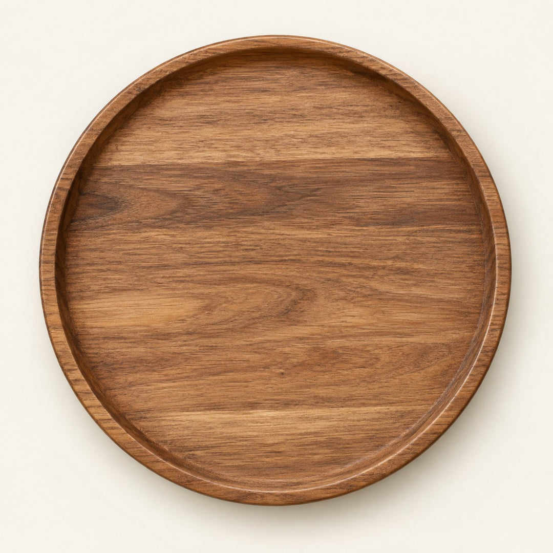 Small 20 cm round wooden serving tray centered on a light warm studio background.