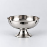 Short pedestal stainless steel dessert cup centered against a light silver studio backdrop.