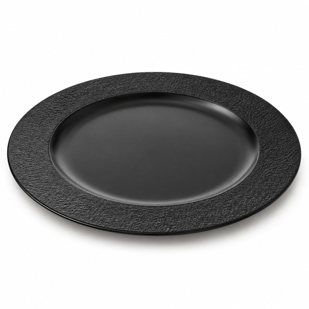 One black melamine serving plate with a wide textured rim and recessed center, shown alone on white.